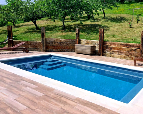 piscina rectangular con banco de fibra de vidrio y poliester 3x6 de color gris oscuro para enterrar peninsula de coinpol