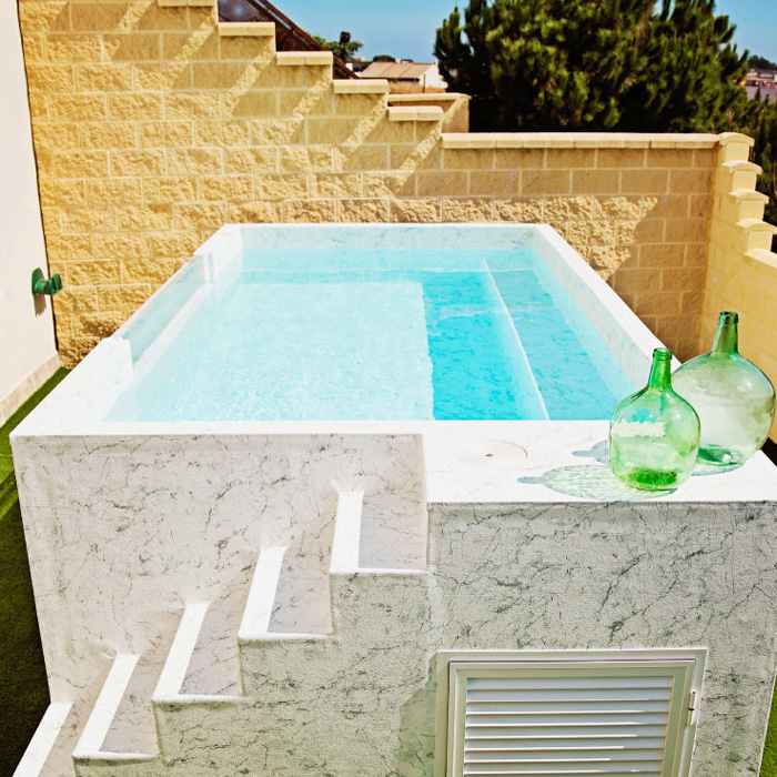 ventajas de las piscinas prefabricadas elevadas de acero y liner para terraza y patio con escalera piscina de acceso
