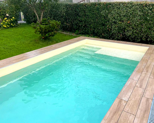 piscina de fibra y resina rectangular 7x3 con playa Copacabana7