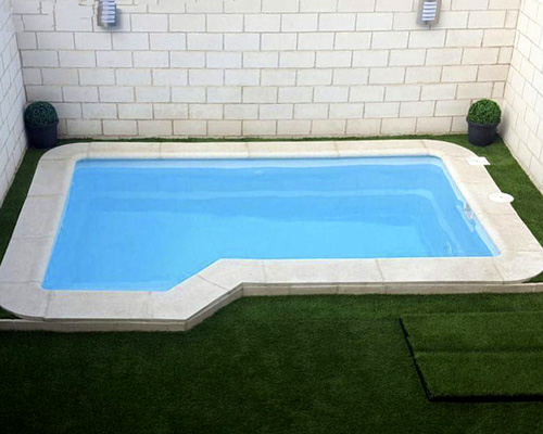 piscina en ele de fibra 6x3 y con desnivel instalada Gandía60