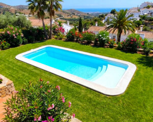 Piscina poliester 7x3 con playa Honolulu71 en Andalucía